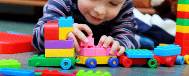 Toddler Playing With Toys